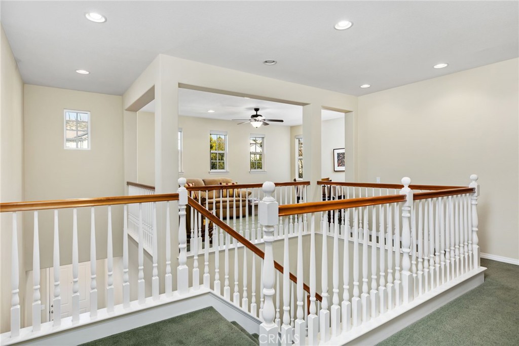 34641 Irwin Street Beaumont, CA 92223 - Photo 5 of 63 a view of staircase with wooden floor