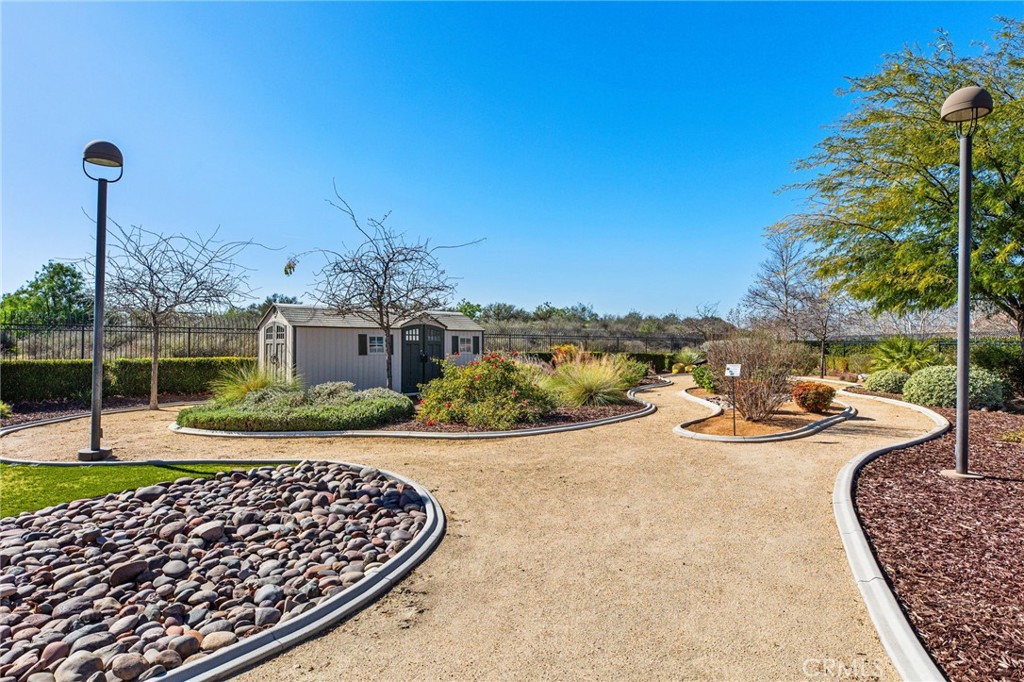 34641 Irwin Street Beaumont, CA 92223 - Photo 54 of 63 a view of a backyard with sitting area
