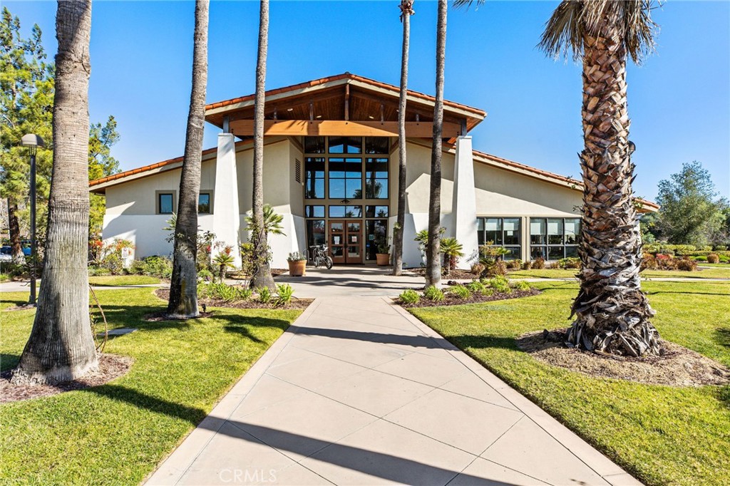 34641 Irwin Street Beaumont, CA 92223 - Photo 59 of 63 a front view of a house with a yard