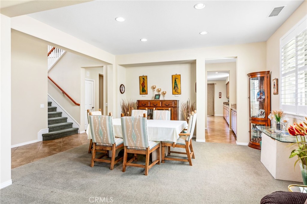 34641 Irwin Street Beaumont, CA 92223 - Photo 8 of 63 a view of a livingroom with furniture and a dining table