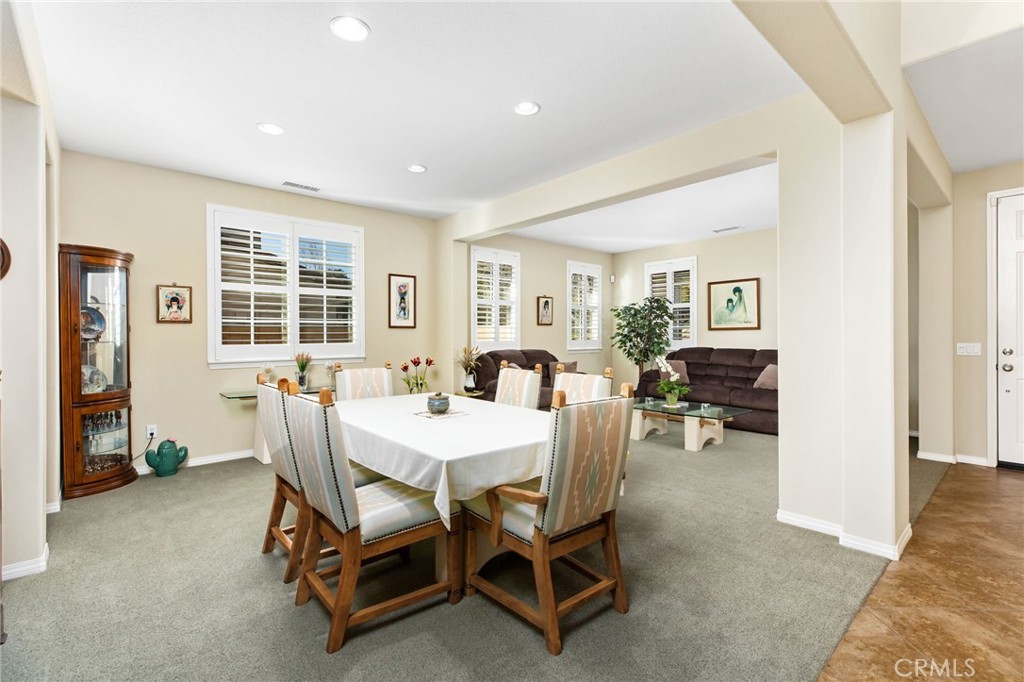 34641 Irwin Street Beaumont, CA 92223 - Photo 9 of 63 a view of a dining room with furniture