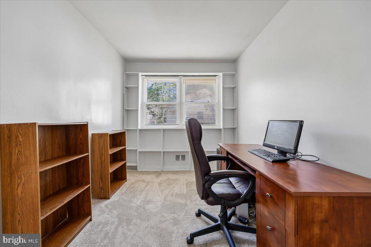 5001 Aspen Hill Road Rockville, MD 20853 - Photo 38 of 68 a view of a workspace with furniture