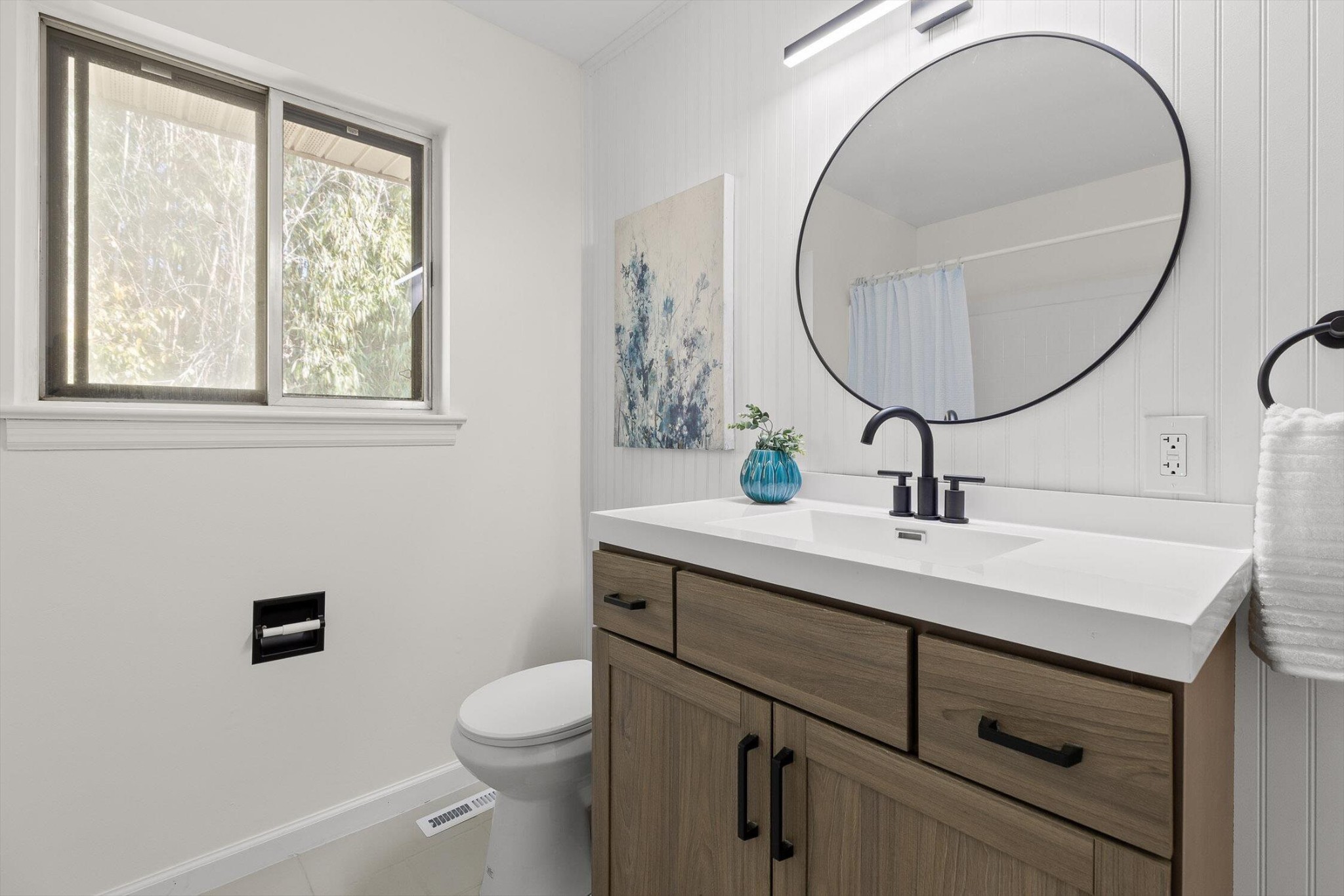 1313 Michael Lane Hixson, TN 37343 - Photo 16 of 24 a bathroom with a toilet a sink and a mirror