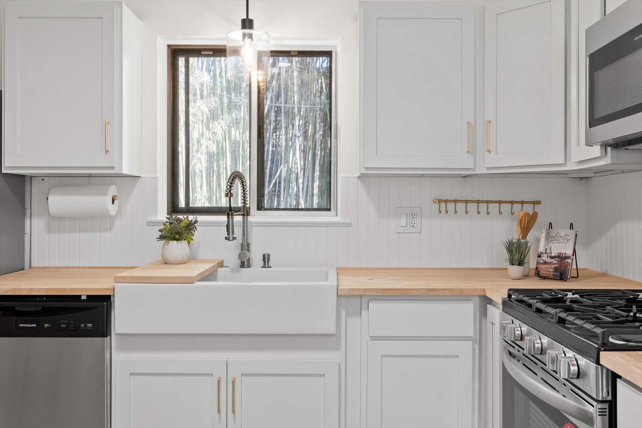 1313 Michael Lane Hixson, TN 37343 - Photo 3 of 24 a kitchen with stainless steel appliances granite countertop a sink stove and cabinets