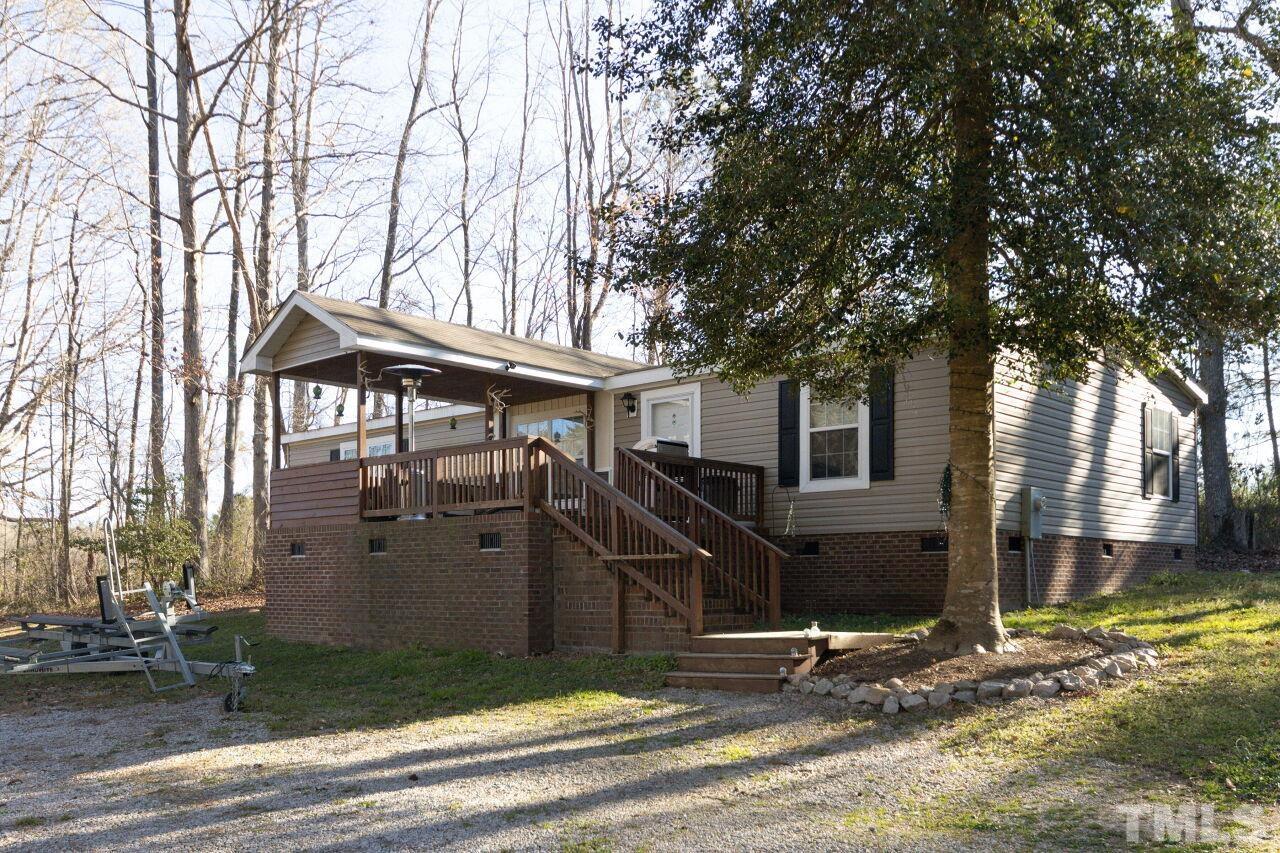 175 Williams Road Spring Hope, NC 27882 - Photo 1 of 30 a view of a house with yard and sitting area