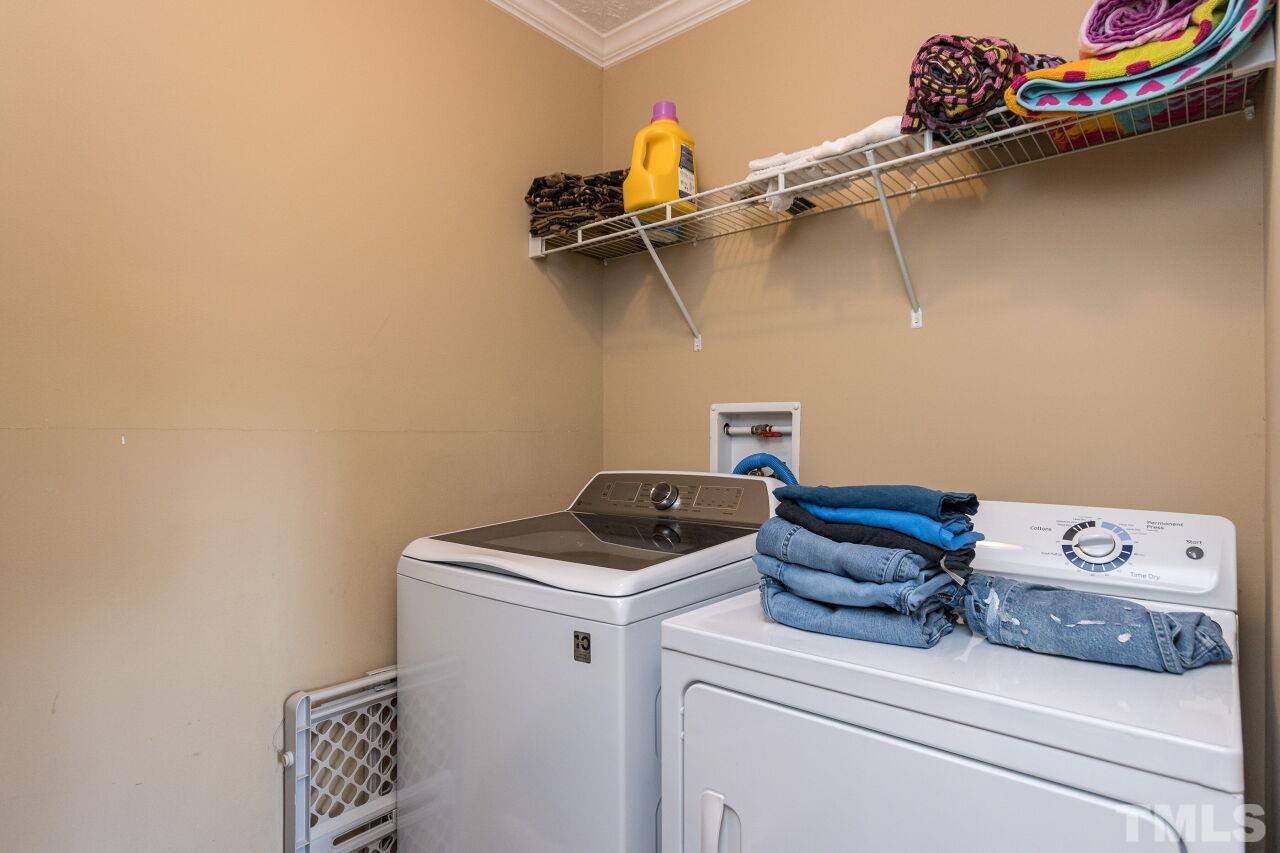 175 Williams Road Spring Hope, NC 27882 - Photo 11 of 30 a utility room with dryer and washer