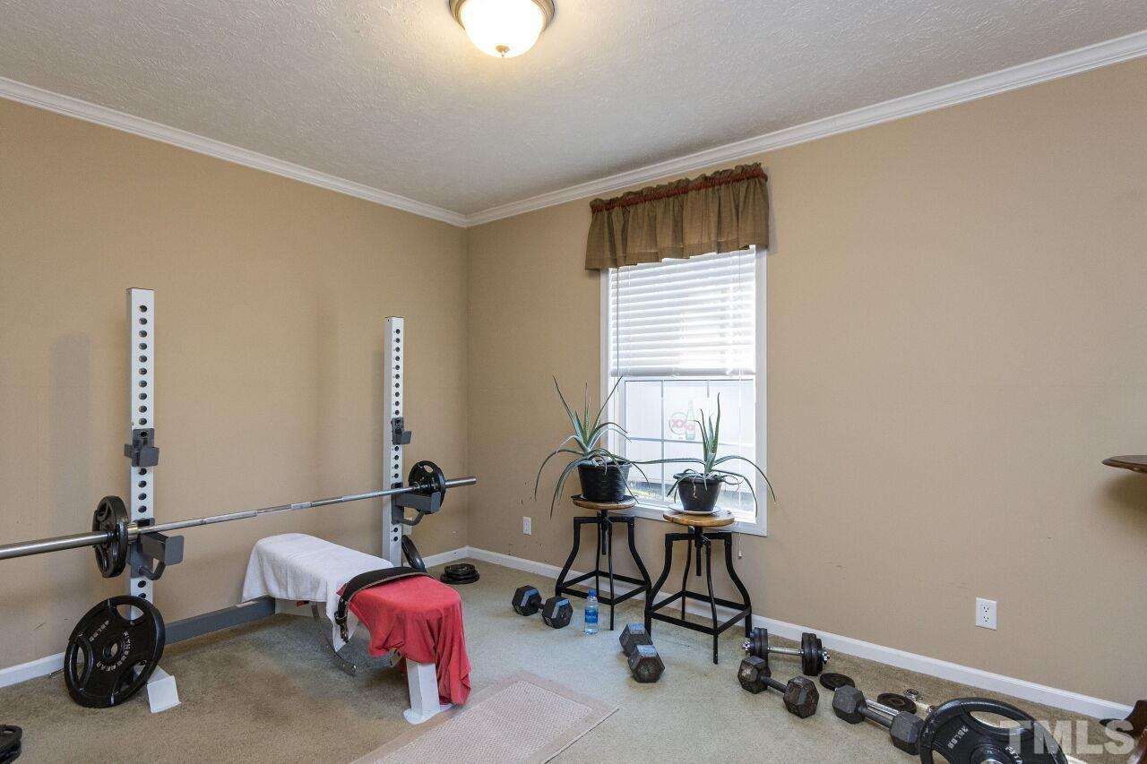 175 Williams Road Spring Hope, NC 27882 - Photo 17 of 30 a view of a room with gym equipment