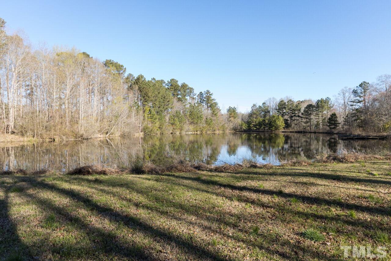 175 Williams Road Spring Hope, NC 27882 - Photo 26 of 30 a view of a field with trees in the background