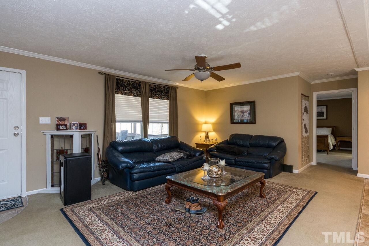 175 Williams Road Spring Hope, NC 27882 - Photo 5 of 30 a living room with furniture and a window