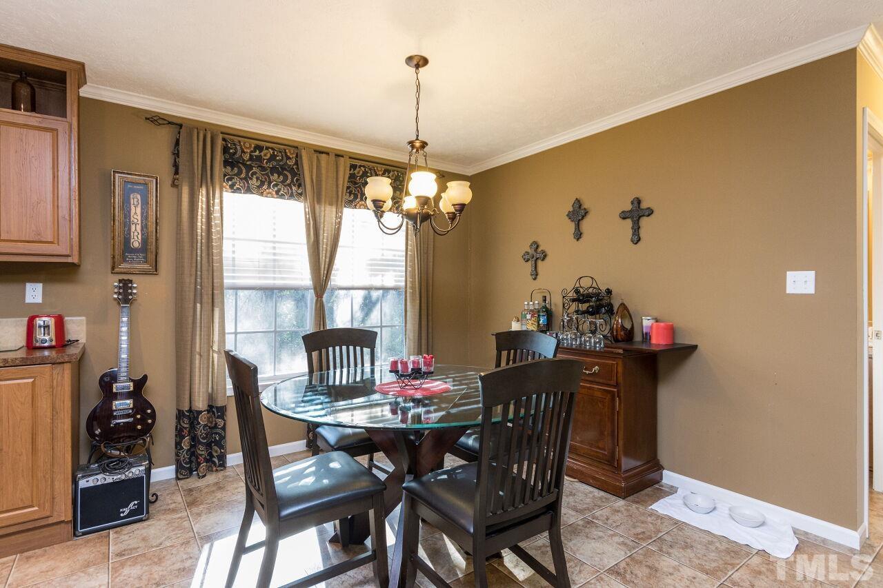 175 Williams Road Spring Hope, NC 27882 - Photo 7 of 30 a view of a dining room with furniture window and outside view