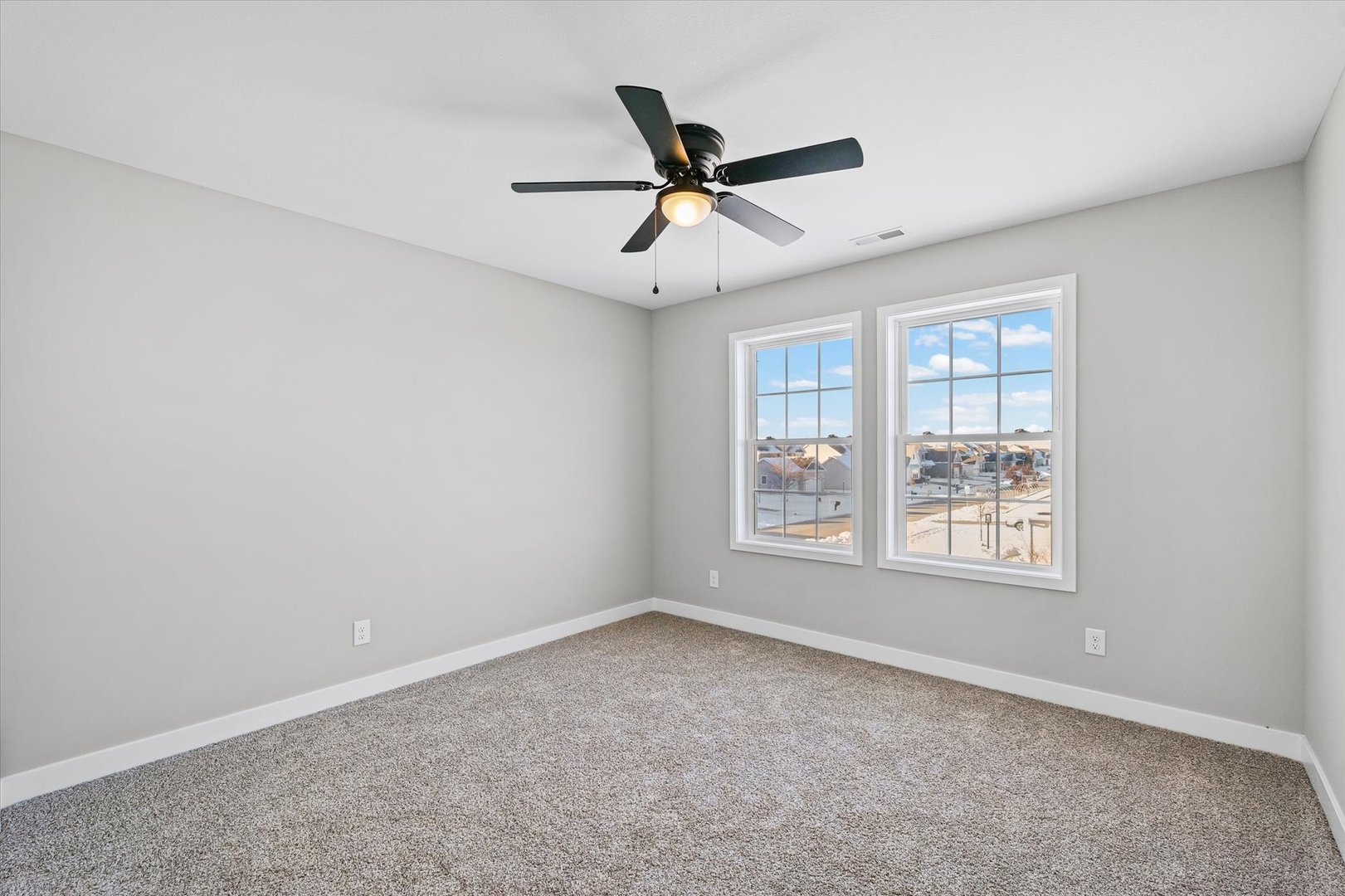 302 Sutton Street Savoy, IL 61874 - Photo 19 of 32 a view of an empty room with a window