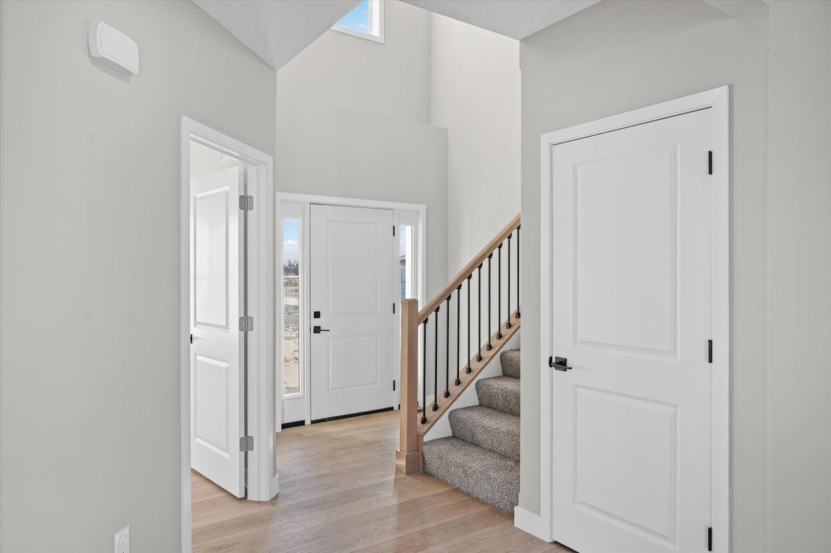302 Sutton Street Savoy, IL 61874 - Photo 5 of 32 a view of a hallway with closet and a bathroom