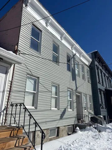 a view of a house with a deck