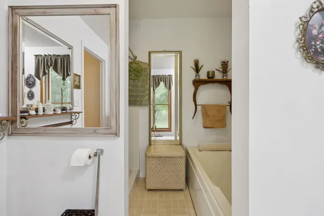 a view of a storage room with a table and chairs