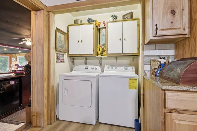 a view of a storage room with a table and chairs