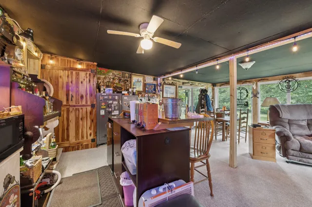 a kitchen with stainless steel appliances granite countertop a stove and a refrigerator