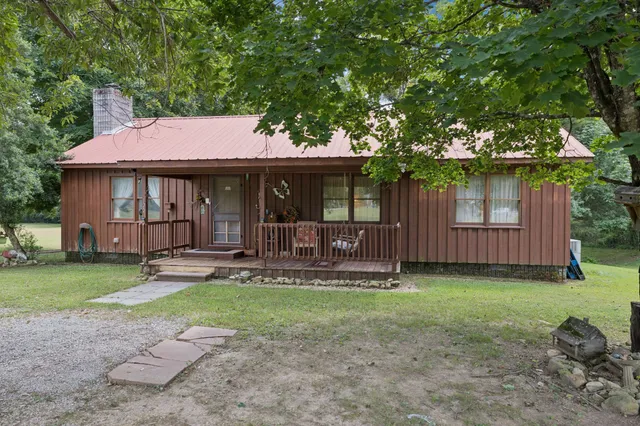 a view of a house with a swimming pool