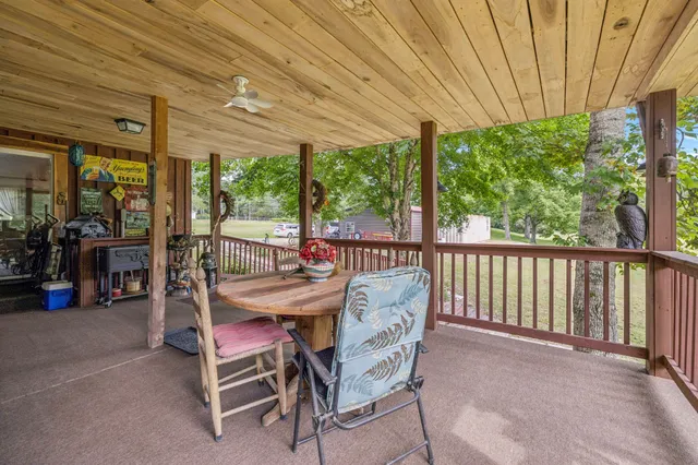 a view of a garage with an outdoor space