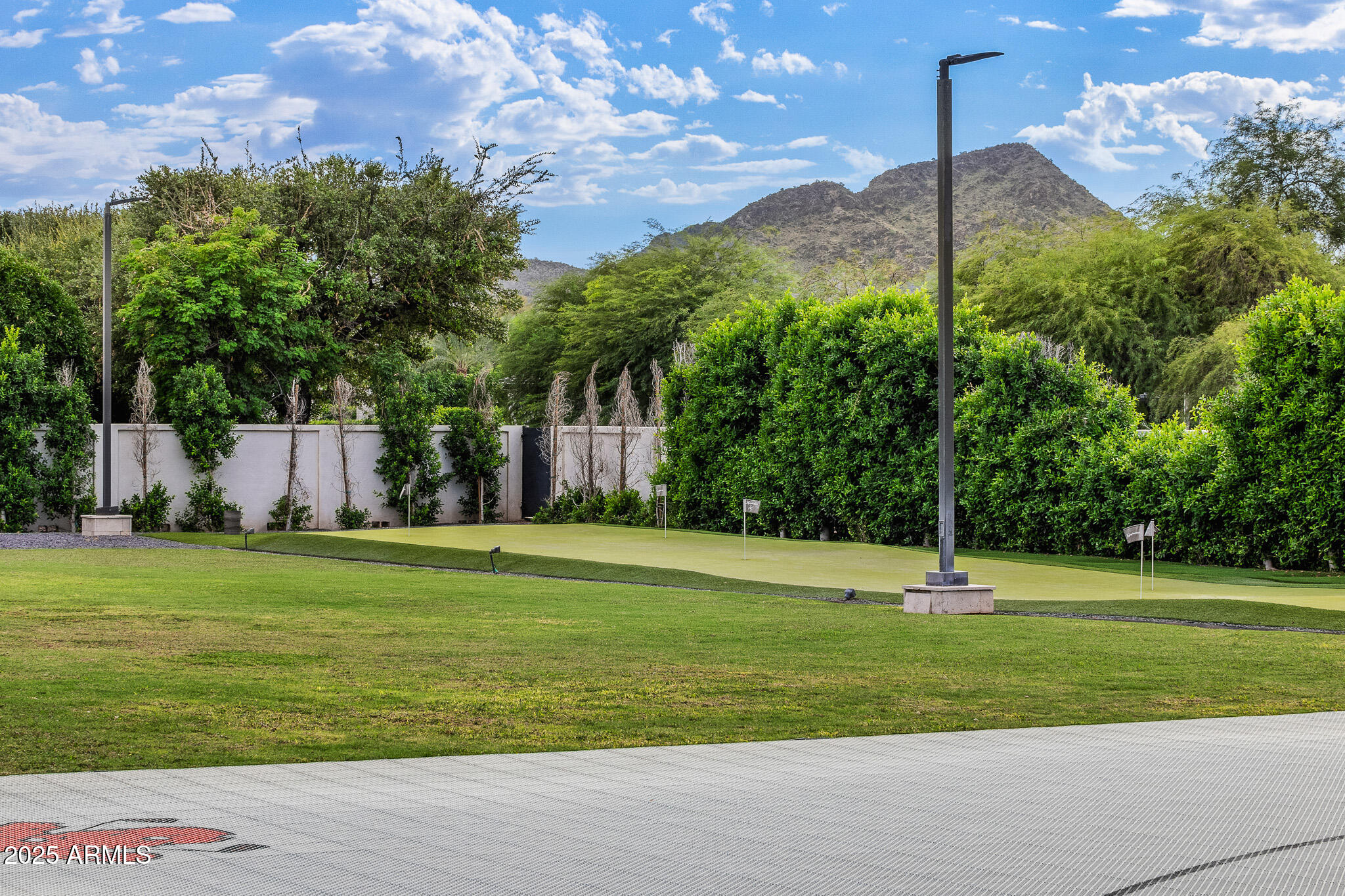 9148 North 66th Place Paradise Valley, AZ 85253 - Photo 45 of 65 51putting green with mountain views