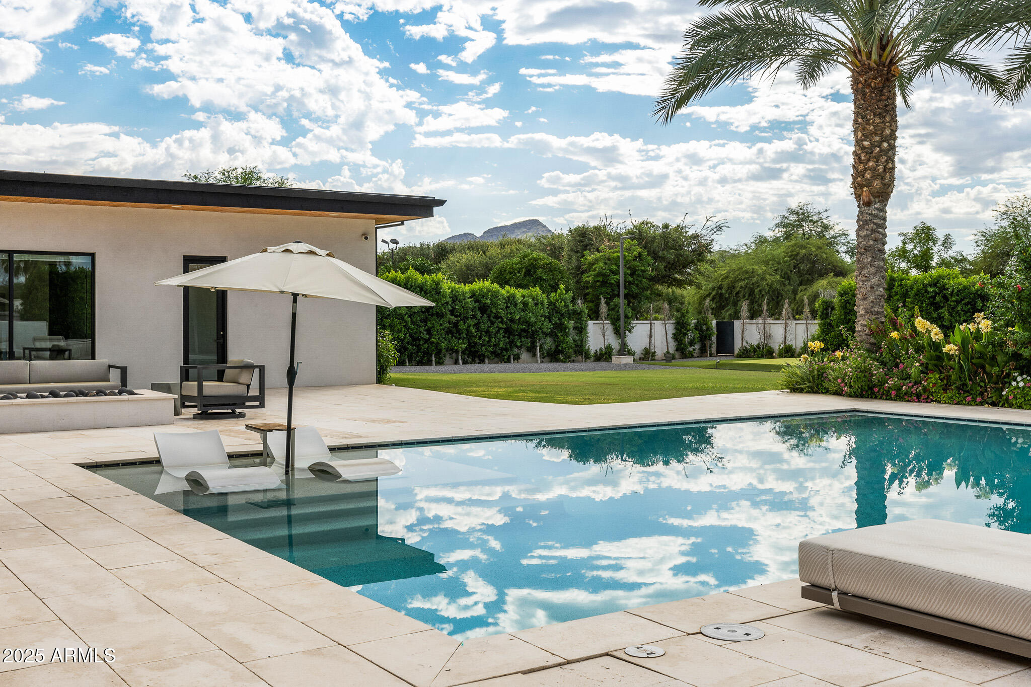 9148 North 66th Place Paradise Valley, AZ 85253 - Photo 50 of 65 56backyard pool with mountain views