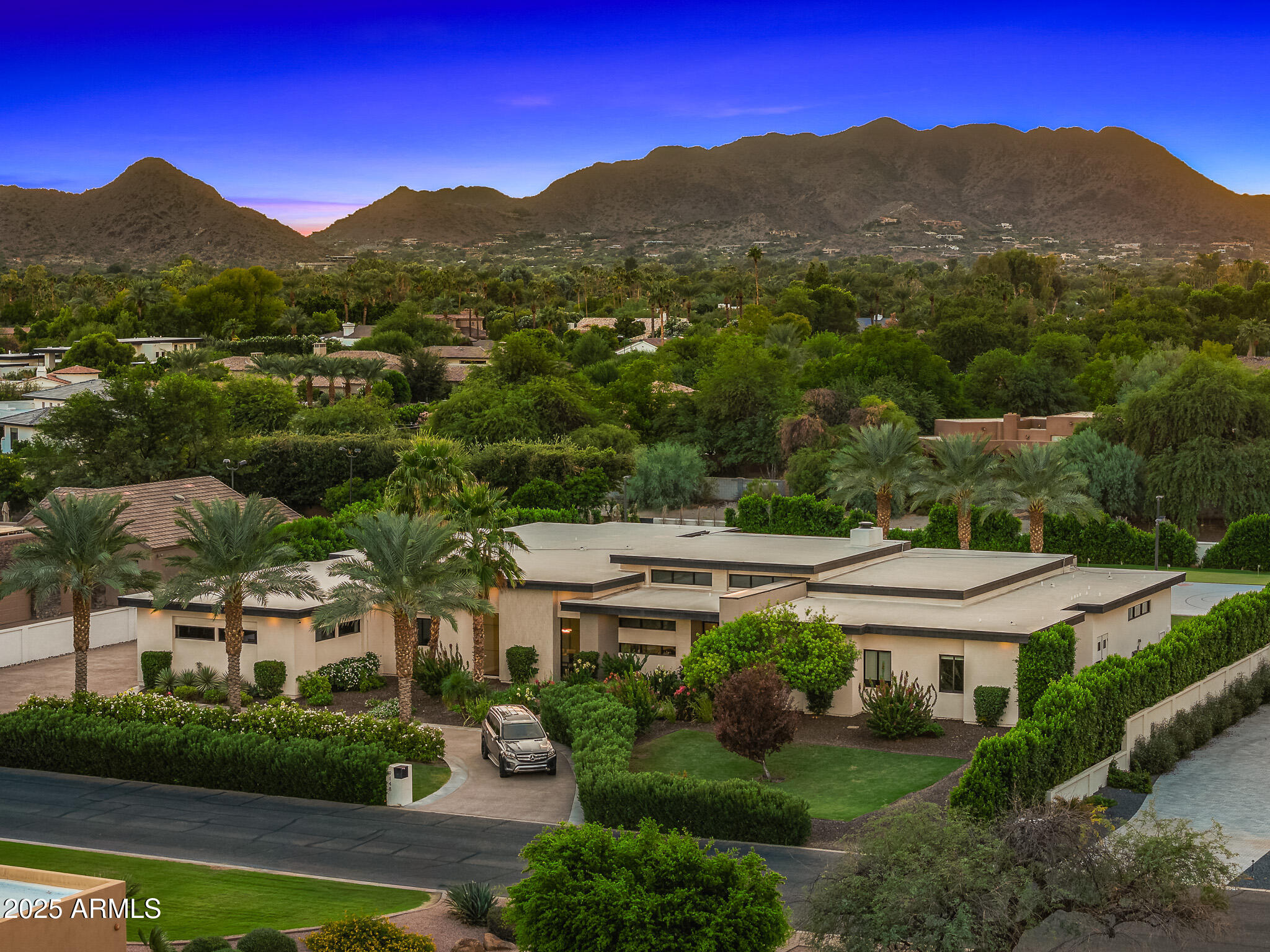 9148 North 66th Place Paradise Valley, AZ 85253 - Photo 55 of 65 64front of property2_aerial twilight
