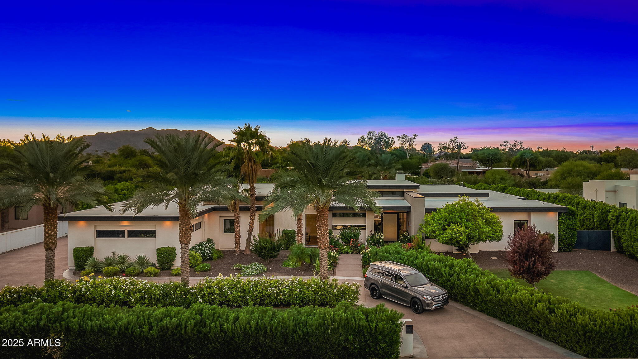 9148 North 66th Place Paradise Valley, AZ 85253 - Photo 56 of 65 65front of property_aerial twilight