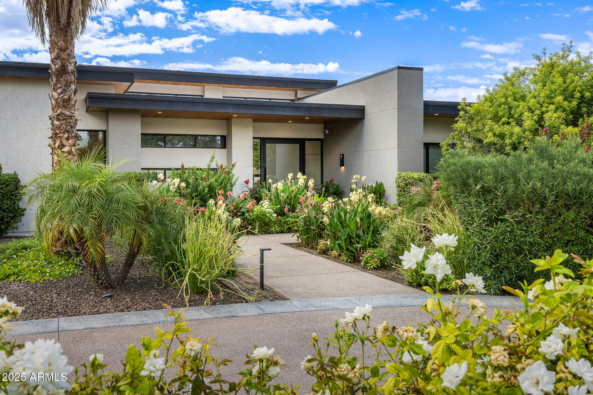 9148 North 66th Place Paradise Valley, AZ 85253 - Photo 8 of 65 05front entrance with landscaping