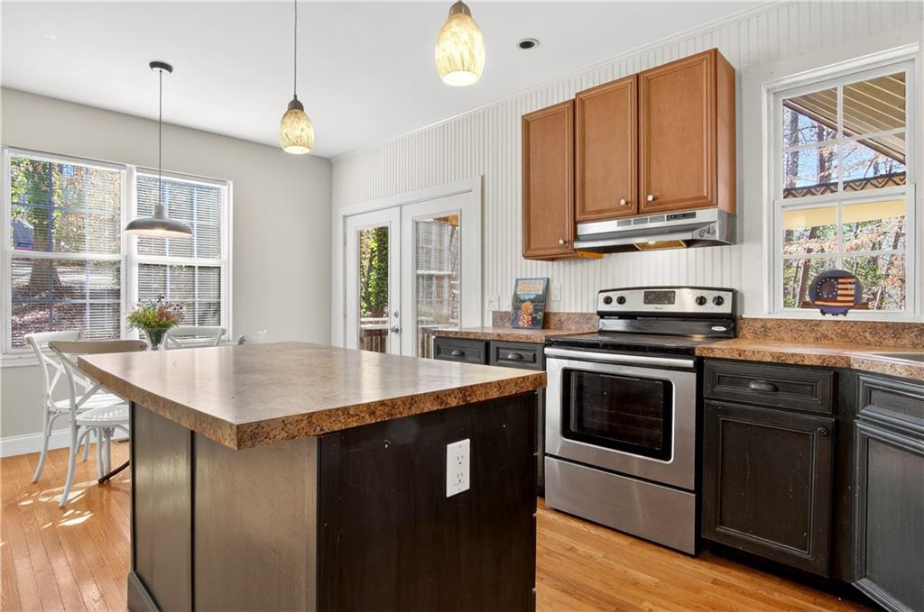 3016 Pathway Road Gainesville, GA 30501 - Photo 17 of 44 a kitchen with stainless steel appliances granite countertop a stove and a sink