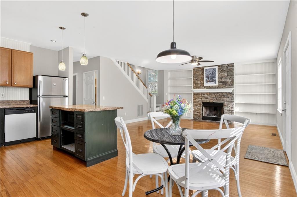 3016 Pathway Road Gainesville, GA 30501 - Photo 19 of 44 a dining room with furniture and wooden floor