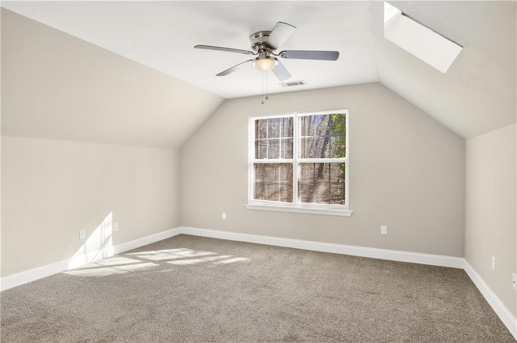3016 Pathway Road Gainesville, GA 30501 - Photo 29 of 44 wooden floor in an empty room with a window