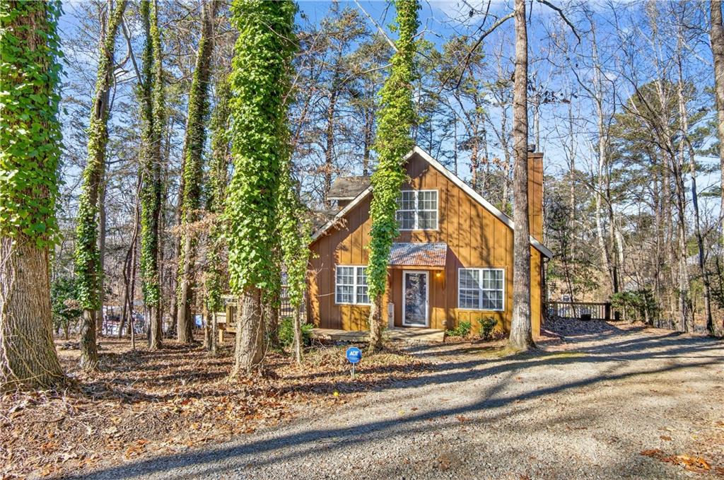 3016 Pathway Road Gainesville, GA 30501 - Photo 3 of 44 a view of a house with large trees and playing area