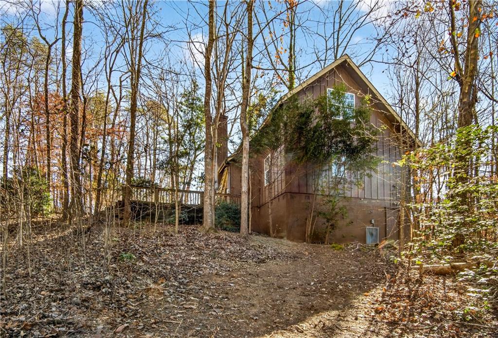 3016 Pathway Road Gainesville, GA 30501 - Photo 33 of 44 a backyard of a house with lots of green space