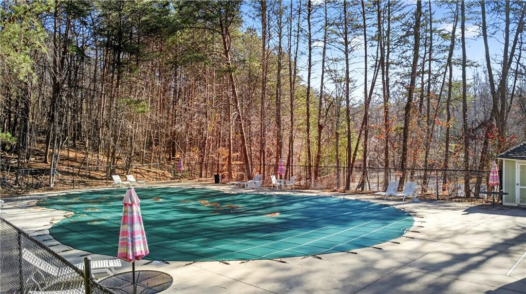 3016 Pathway Road Gainesville, GA 30501 - Photo 38 of 44 a backyard with tall trees