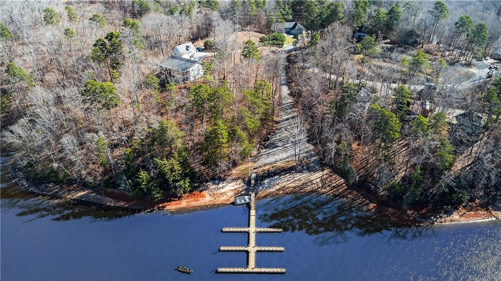 3016 Pathway Road Gainesville, GA 30501 - Photo 41 of 44 a backyard of a house with a yard and outdoor seating