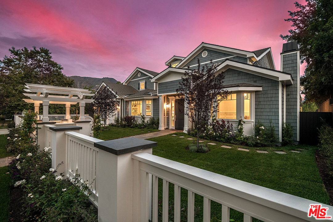 231 South Valley Street Burbank, CA 91505 - Photo 2 of 43 a front view of a house with a yard