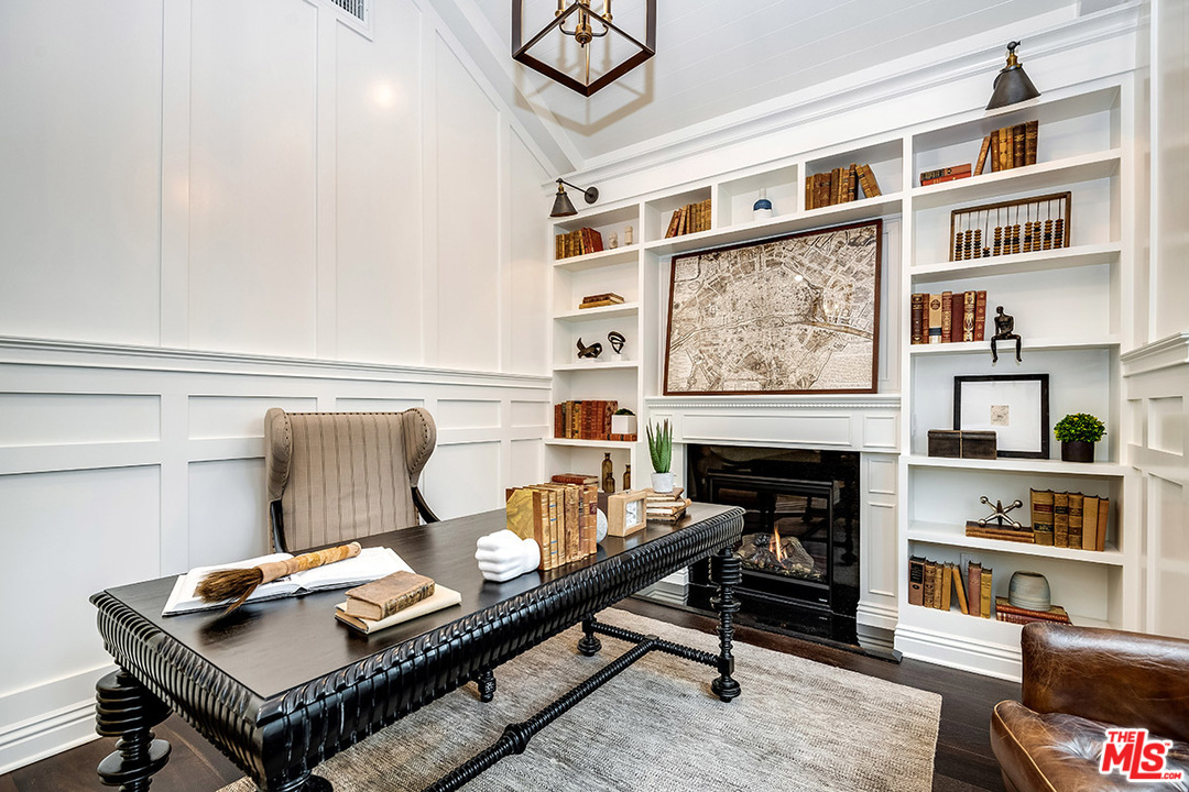 231 South Valley Street Burbank, CA 91505 - Photo 18 of 43 a living room with furniture a rug and a fireplace