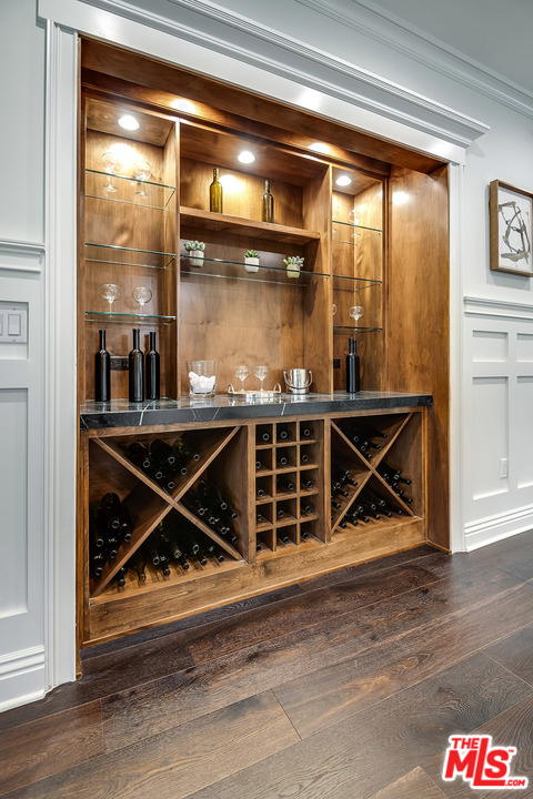 231 South Valley Street Burbank, CA 91505 - Photo 19 of 43 a room with wooden floor and a glass door