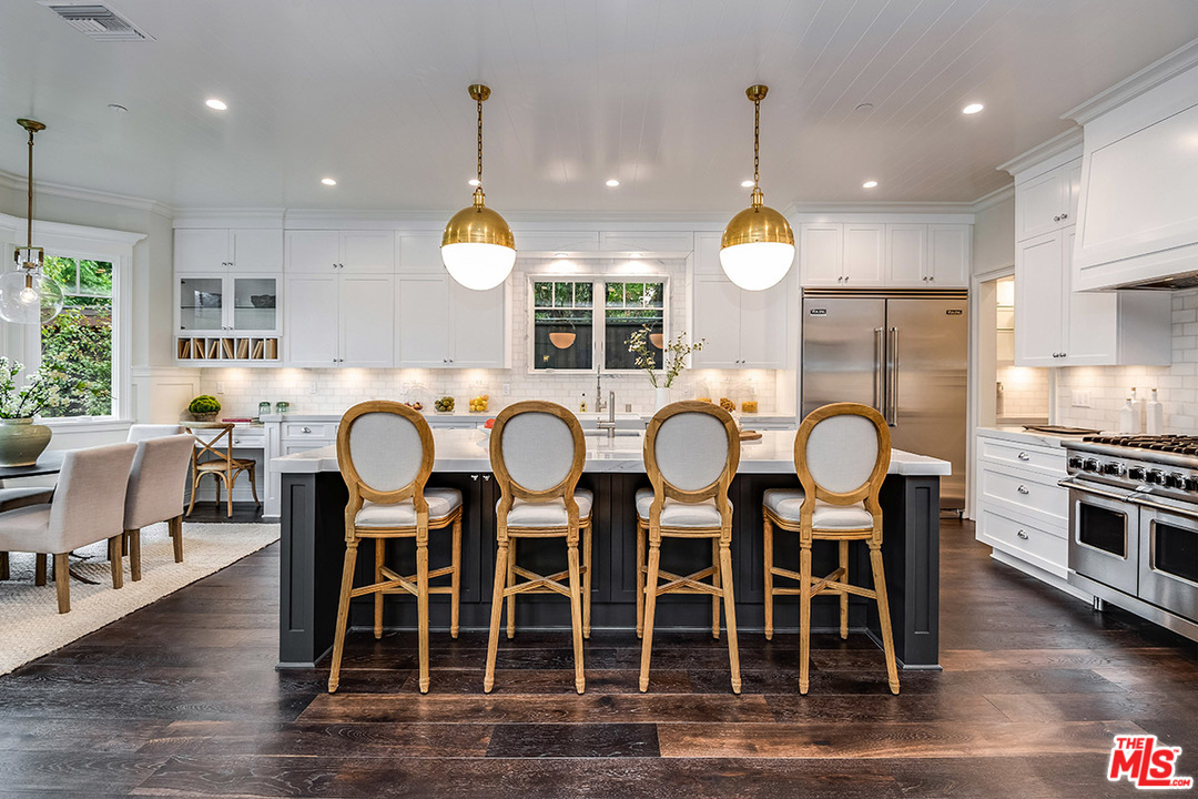 231 South Valley Street Burbank, CA 91505 - Photo 21 of 43 a view of a dining room with furniture window and wooden floor