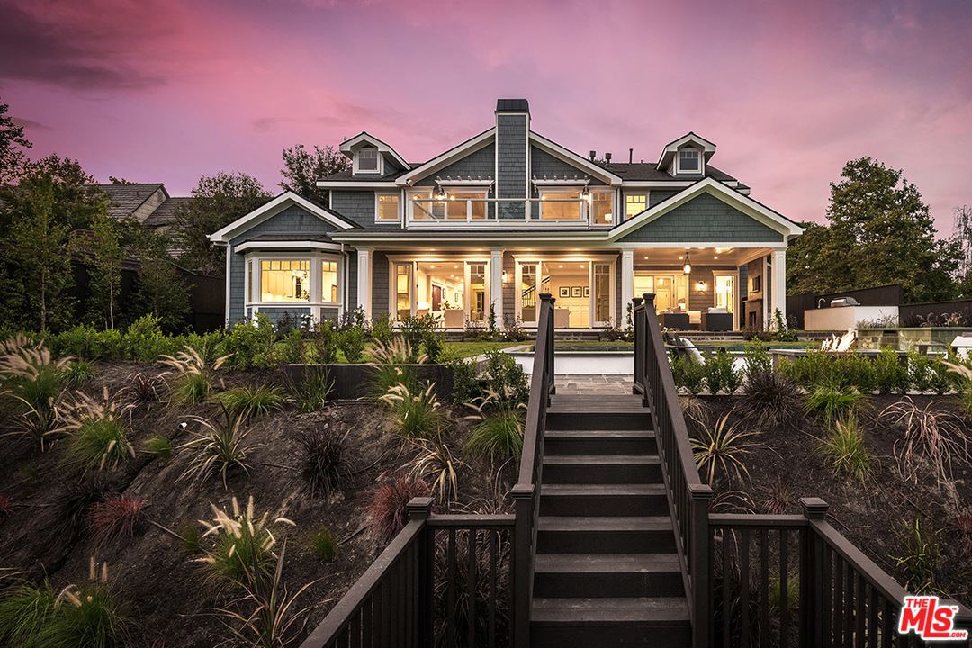 231 South Valley Street Burbank, CA 91505 - Photo 4 of 43 a front view of a house with a yard