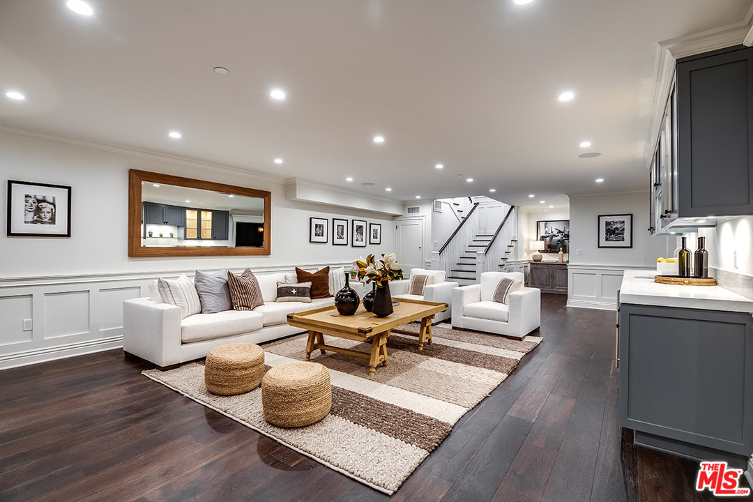 231 South Valley Street Burbank, CA 91505 - Photo 32 of 43 a living room with furniture wooden floor and a large window
