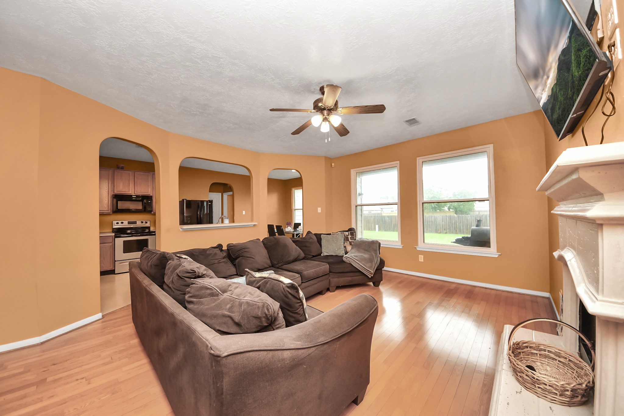 23814 Spring Dane Drive Spring, TX 77373 - Photo 14 of 41 a living room with furniture and a floor to ceiling window