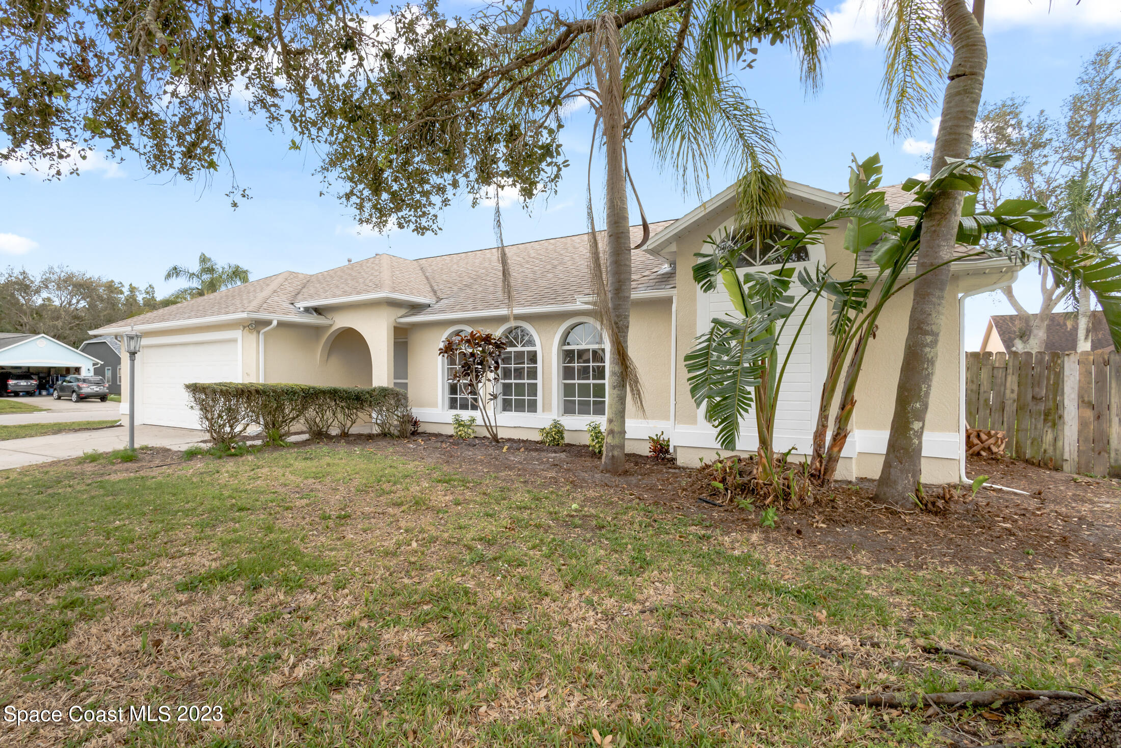 1940 Slone Boulevard Melbourne, FL 32935 - Photo 2 of 27 a view of a house with a patio