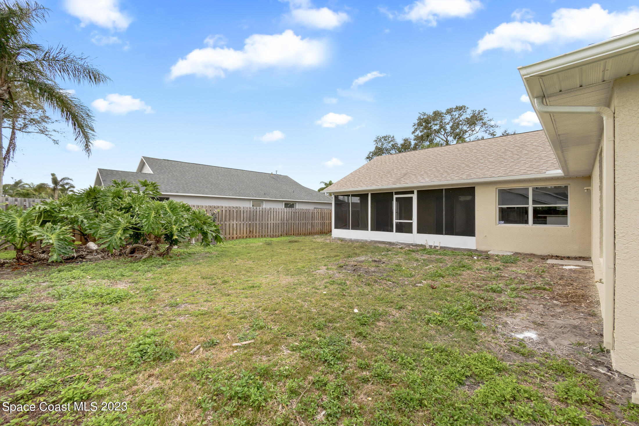 1940 Slone Boulevard Melbourne, FL 32935 - Photo 26 of 27 a house view with a garden space