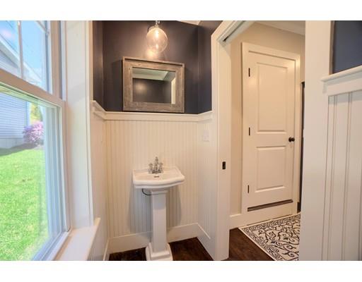 44 Hillcrest Road Waltham, MA 02451 - Photo 11 of 26 a bathroom with a sink and a mirror
