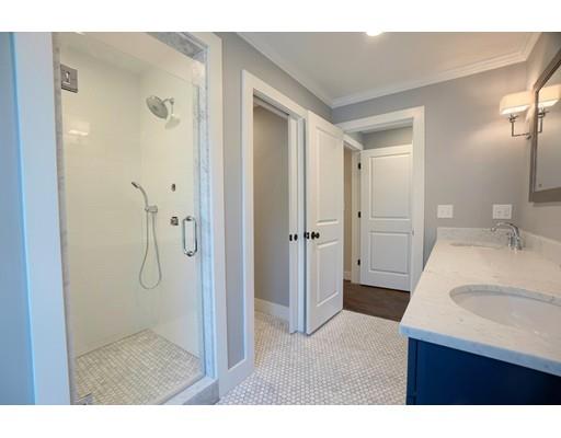 44 Hillcrest Road Waltham, MA 02451 - Photo 14 of 26 a bathroom with a granite countertop sink mirror and shower