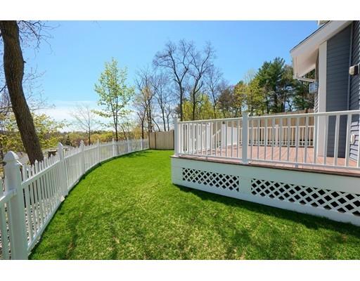 44 Hillcrest Road Waltham, MA 02451 - Photo 23 of 26 a view of a deck with a yard