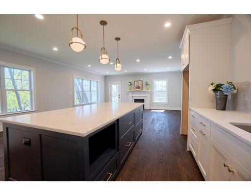 44 Hillcrest Road Waltham, MA 02451 - Photo 6 of 26 a kitchen with a sink a counter space and wooden floor
