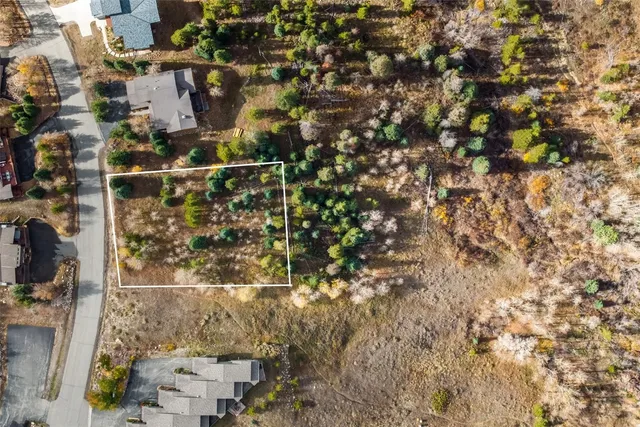 wooden floor with a water view