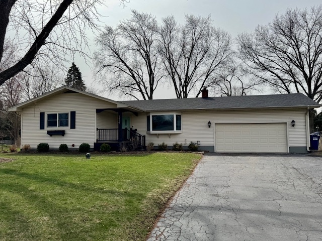 774 Considine Road Geneva, IL 60134 - Photo 1 of 43 a view of a house with a yard