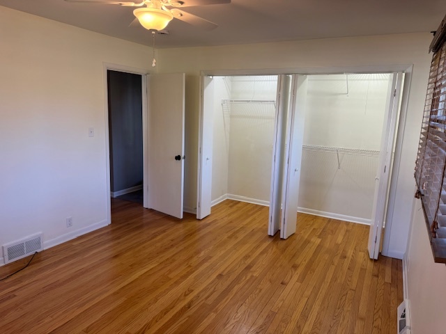 774 Considine Road Geneva, IL 60134 - Photo 12 of 43 wooden floor in an empty room with a window